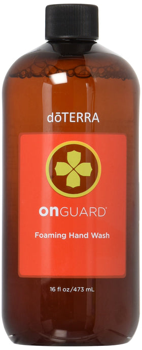 doTERRA On Guard refill being poured into foaming dispenser for convenient refill