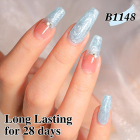 Double Rhythm lifestyle shot of model with soft pastel manicure showcasing elegance