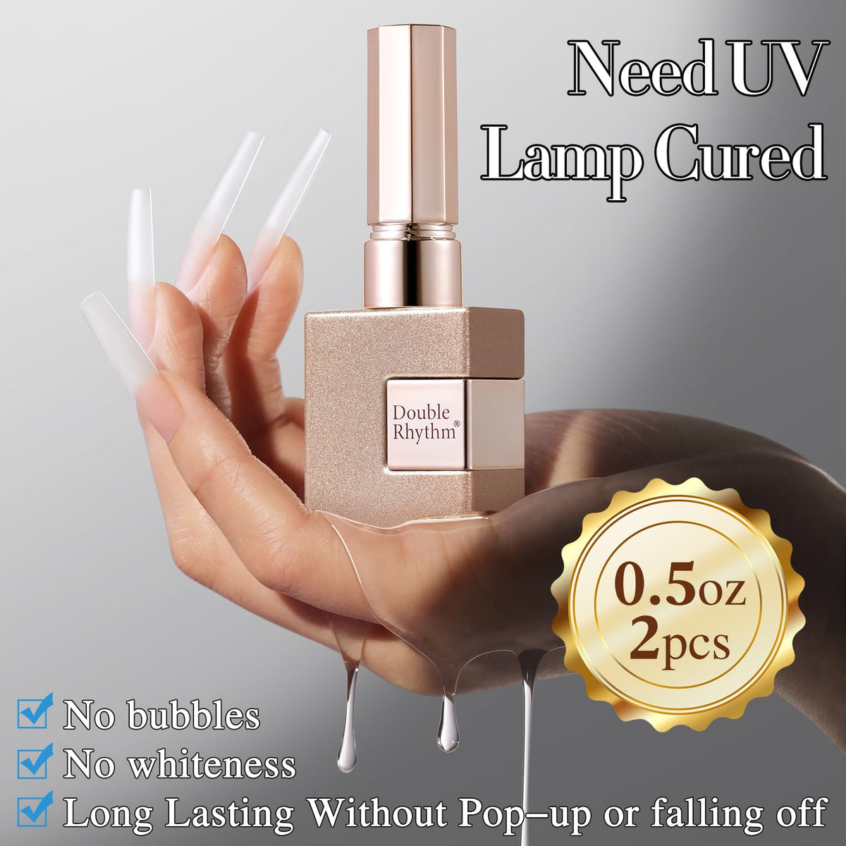 Double Rhythm attaching a press-on nail for quick at-home manicure hold