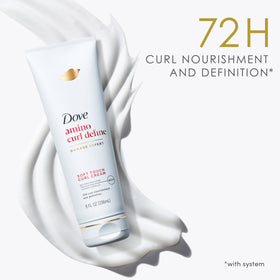 Dove Amino Curl cream dispensed on hand demonstrating easy spreadability