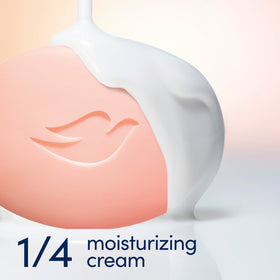 Dove bar held in hand to show scale and easy daily use benefit