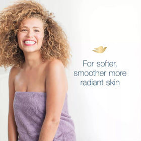 Dove bars creating creamy lather in hand for gentle cleansing benefit