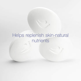 Dove beauty bar side profile highlighting smooth shape and moisturizing cream content benefit