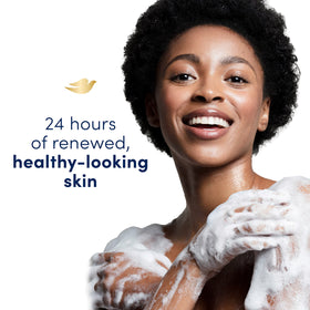 Dove body wash in shower setting illustrating soothing routine and soft skin benefit