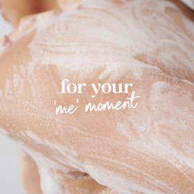 Person using Dove body wash with loofah, Dove nourishing cleanse benefit