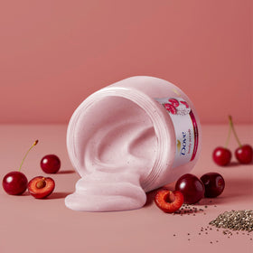 Dove close-up texture shot of scrub granules and creamy base illustrating gentle exfoliation