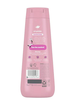 Dove pump dispensing Confetti Cake wash in shower demonstrating nourishing lather