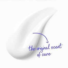 Dove texture close-up with micro-moisture droplets for soft skin
