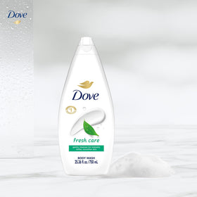 Dove bottle next to everyday items to show 25.36 oz scale and value