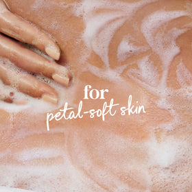 Person using Dove body wash in shower for hydrated skin
