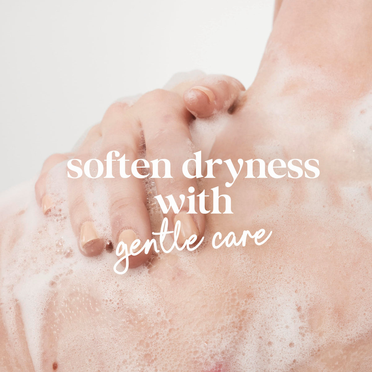 Person using Dove in shower illustrating sensitive-skin friendly, non-irritating cleanse