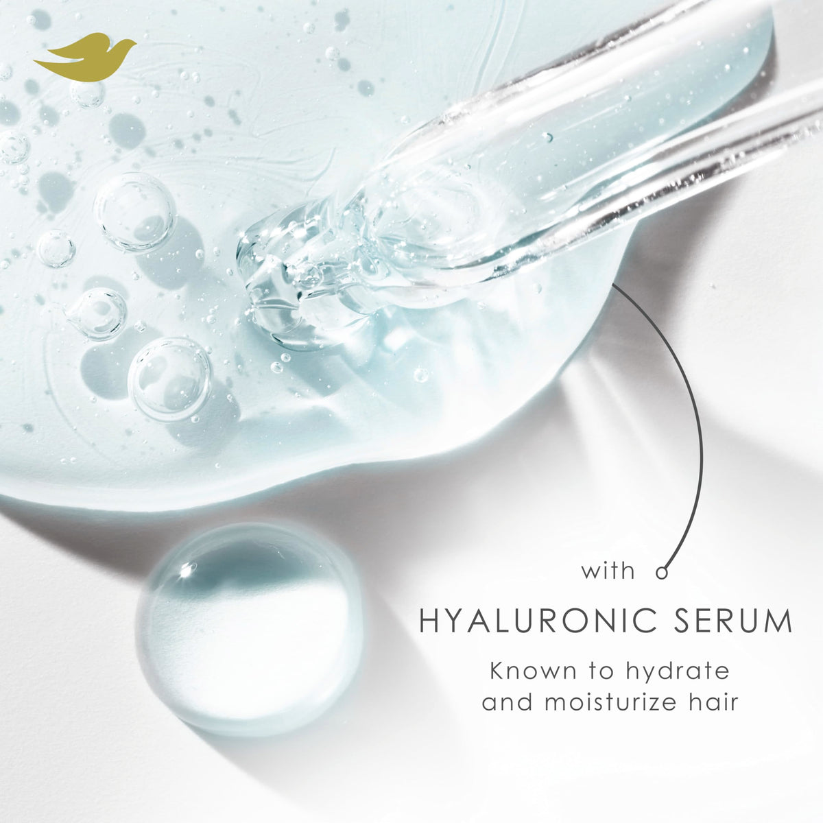 Dove hyaluronic serum drop on hair strand illustrating moisture-attracting benefit
