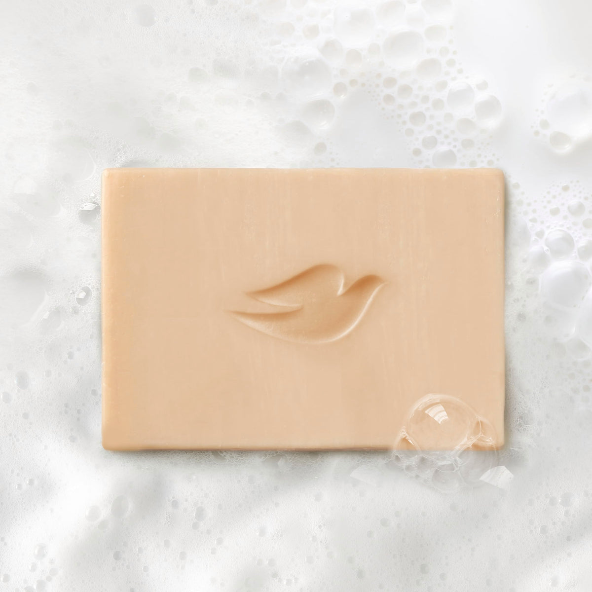 Coconut milk pouring over a bar to highlight plant-based milk hydration benefit
