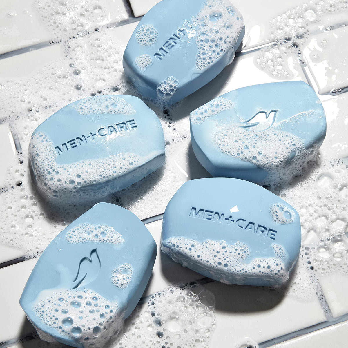 DOVE MEN + CARE bar beside ruler showing 3.75 oz size and travel convenience