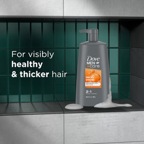Dove Men+Care bottle in hand for size comparison, large 25.4 oz value benefit
