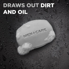Dove Men+Care bar in hand showing 3.75 oz scale and travel-friendly benefit