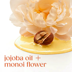 Dove radiance jojoba oil closeup indicating nourishing oil blend for hydration