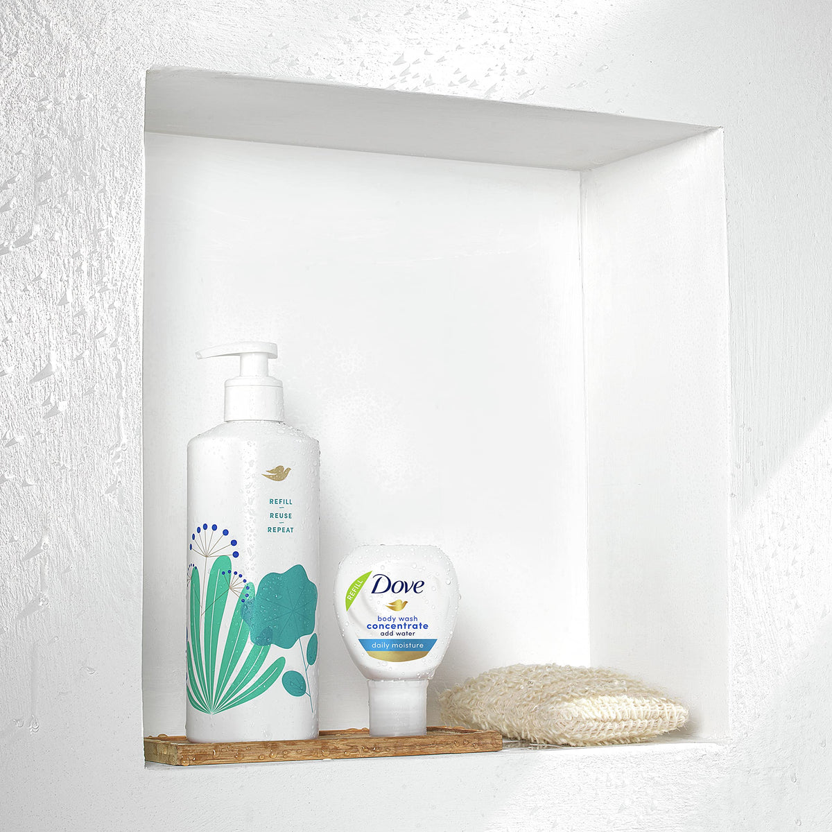 Dove refill connection action demonstrating no-mess transfer into reusable bottle