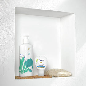 Dove refill connection action demonstrating no-mess transfer into reusable bottle