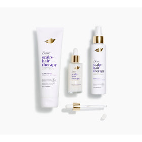 Dove scrub in hand massaging scalp shows effective buildup removal benefit