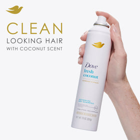 Dove can next to a hand to show 7.3 oz travel-ready convenience benefit