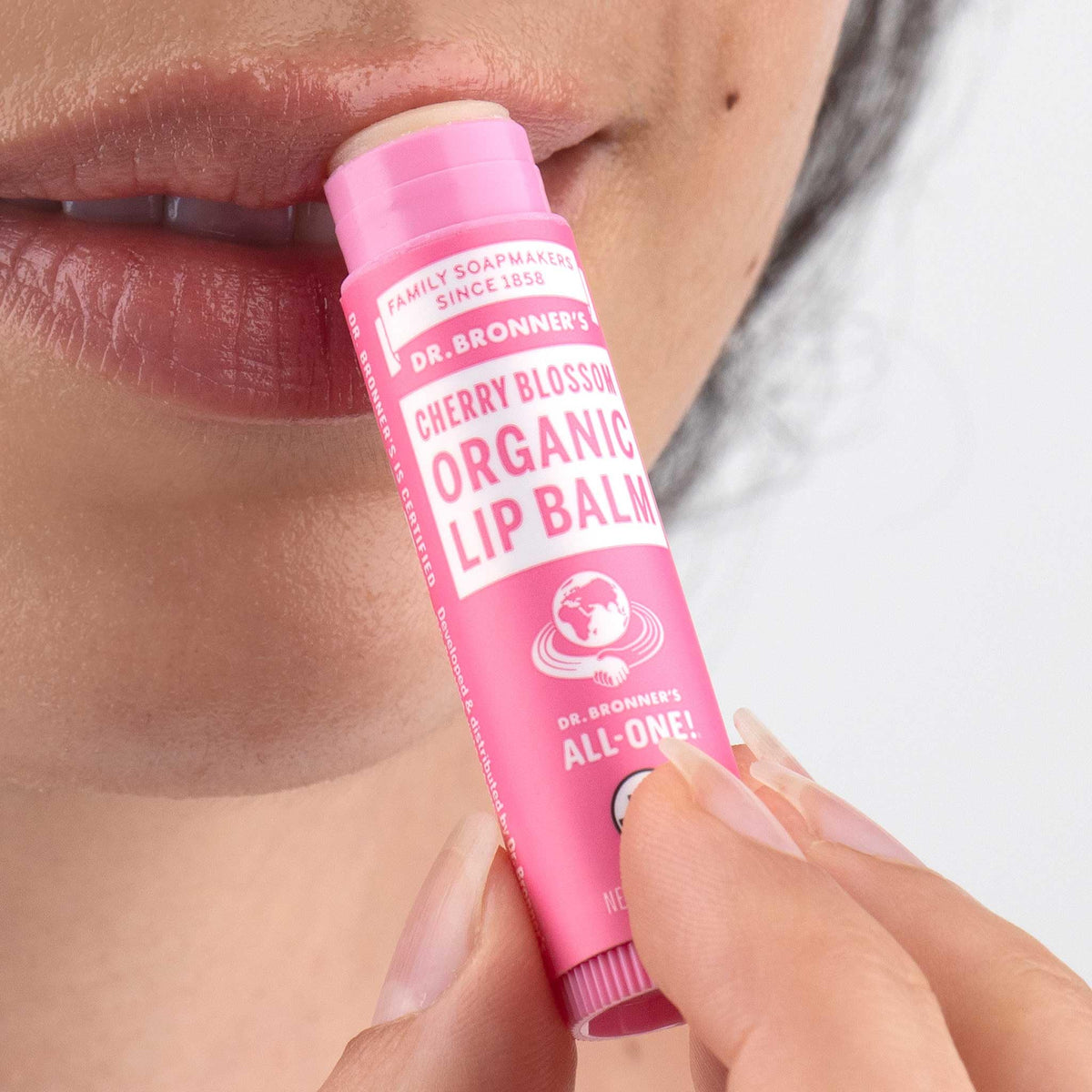 Dr. Bronner's close-up texture highlighting beeswax sheen and moisturizing oils
