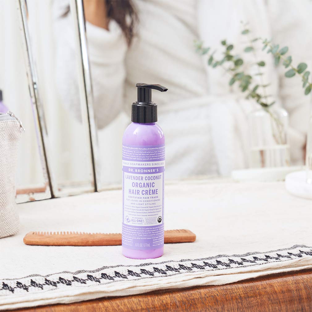 Applying Dr. Bronner's creme on hands to demonstrate easy distribution and control