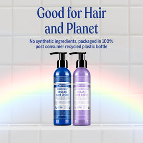Dr. Bronner's 6oz jar in hand to show compact travel-friendly size