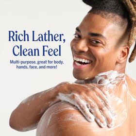 Dr. Bronner's bottle in shower illustrating multitasking body and hair use