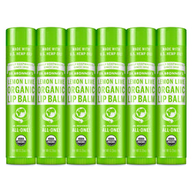 Dr. Bronner's front packaging showing six Lemon Lime lip balm tubes and benefits