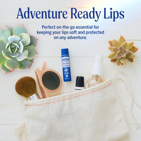 Dr. Bronner's lip balm in pocket illustrating compact size and on-the-go hydration
