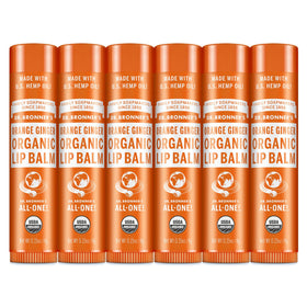 Dr. Bronner's front packaging showing six orange-ginger lip balm tubes for everyday hydration