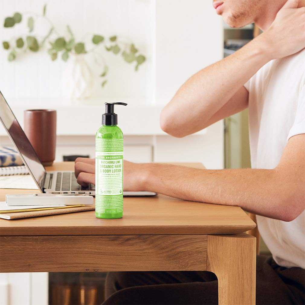 Dr. Bronner's patchouli lime pump being pressed for controlled dispensing and convenience