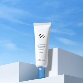 Applying Dr.Ceuracle on face for non-sticky, dewy protection