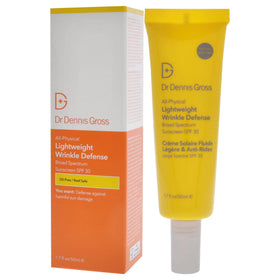 Dr Dennis Gross tube beside a card showing 1.7 oz size for travel convenience
