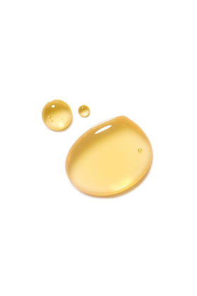 Dr. Hauschka oil texture close-up on skin, demonstrates quick absorption benefit