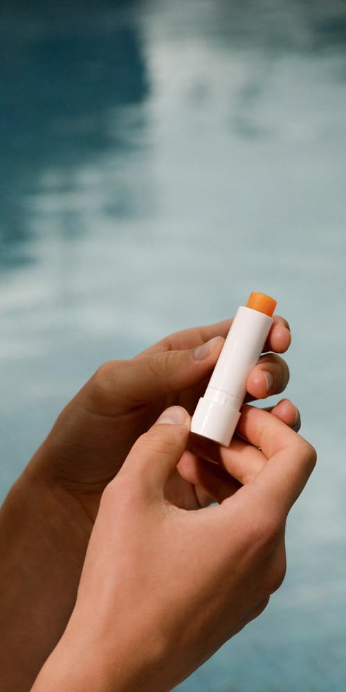 Dr. Hauschka held in hand to show size and easy portability benefit