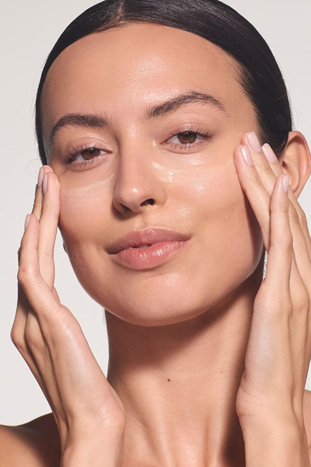 Dr. Hauschka lotion spread on hand demonstrating quick absorption benefit