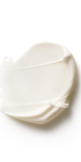 Dr. Hauschka application on model pressing cream into skin for hydration