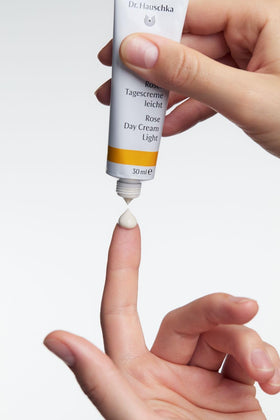 Dr. Hauschka jar on bathroom shelf in natural light for daily routine