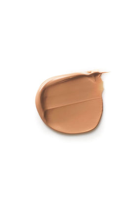 Dr. Hauschka tinted cream spread on hand illustrating coverage and blendability