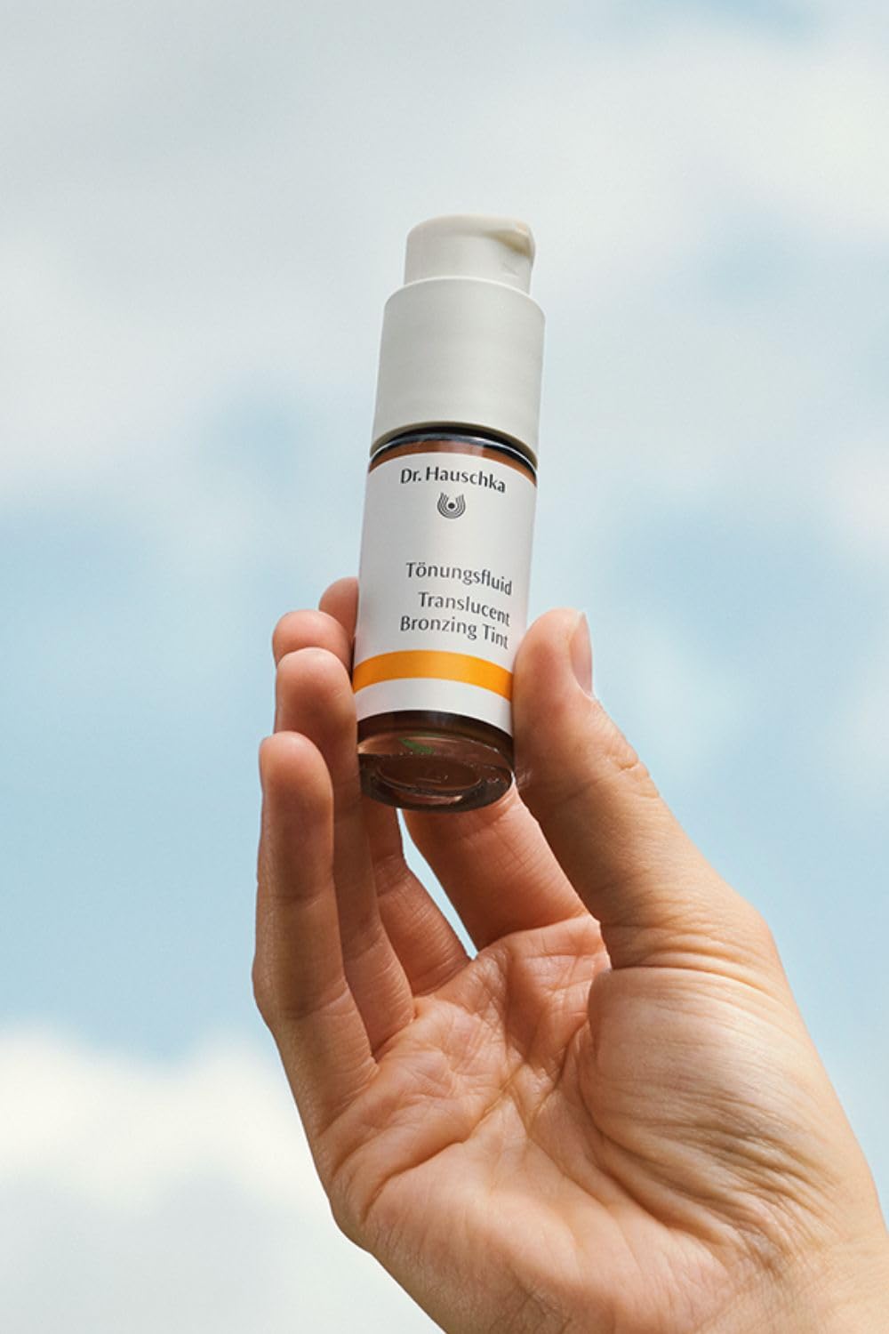 Dr. Hauschka tint mixed into moisturizer demonstrating customizable warmth