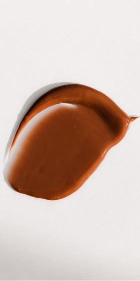 Dr. Hauschka arm swatches showing buildable bronzing shades and natural glow