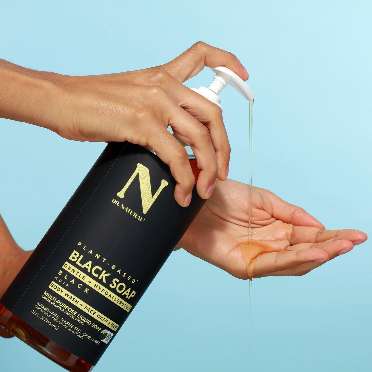 Dr. Natural next to common bottle for scale showing full 32 oz supply