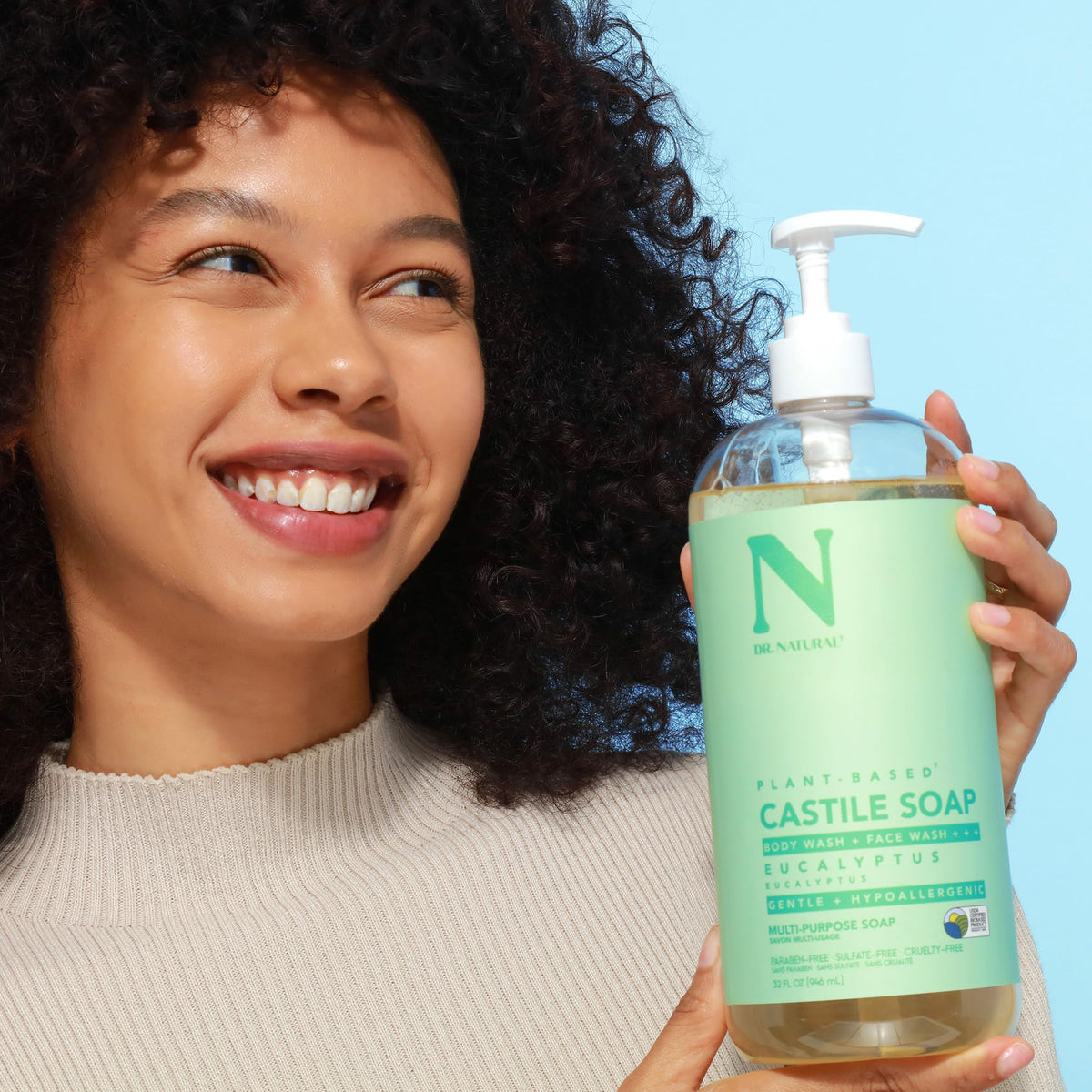 Dr. Natural used to bathe a dog demonstrating mild pet-safe cleaning