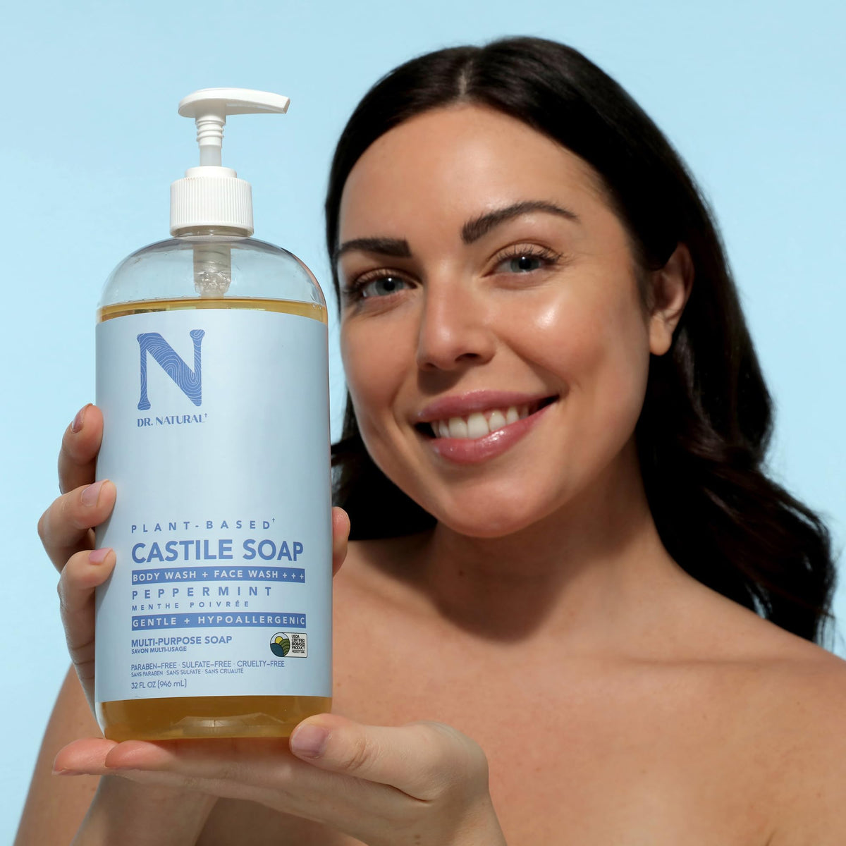 Dr. Natural being dispensed at sink as hand soap for soft, hydrated hands