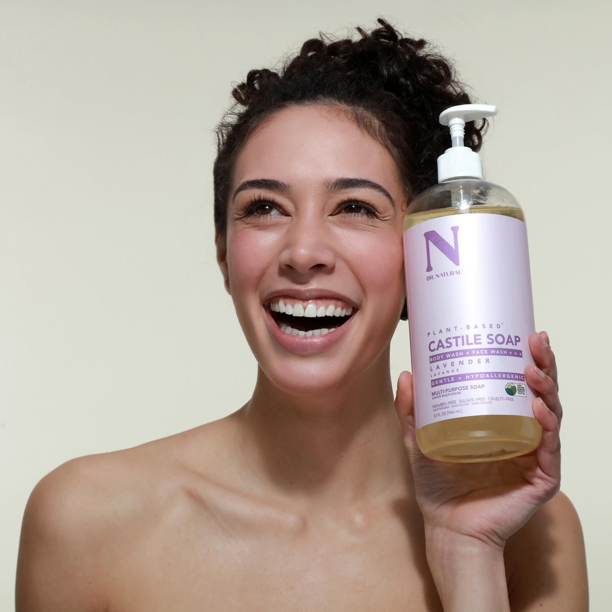Applying Dr. Natural as shampoo in wet hair to show clarifying clean and scalp refresh