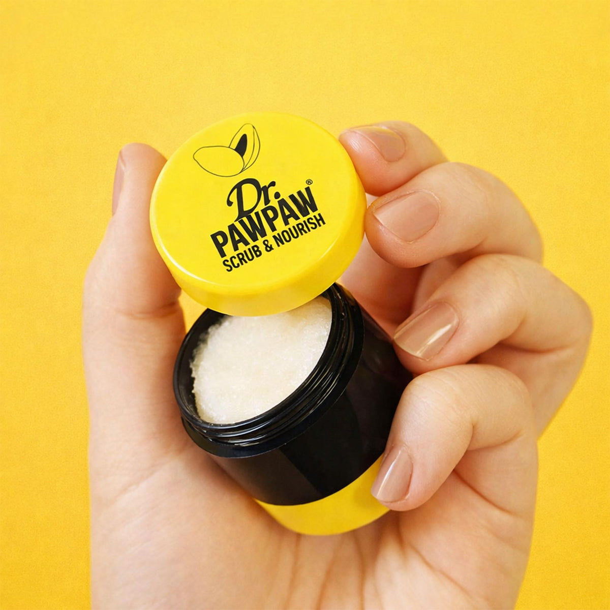 Dr. PAWPAW ORIGINAL BALM scrub texture close-up showing exfoliant and smooth finish