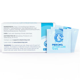 DR. PIERCING AFTERCARE wipes packed in a travel bag for convenience