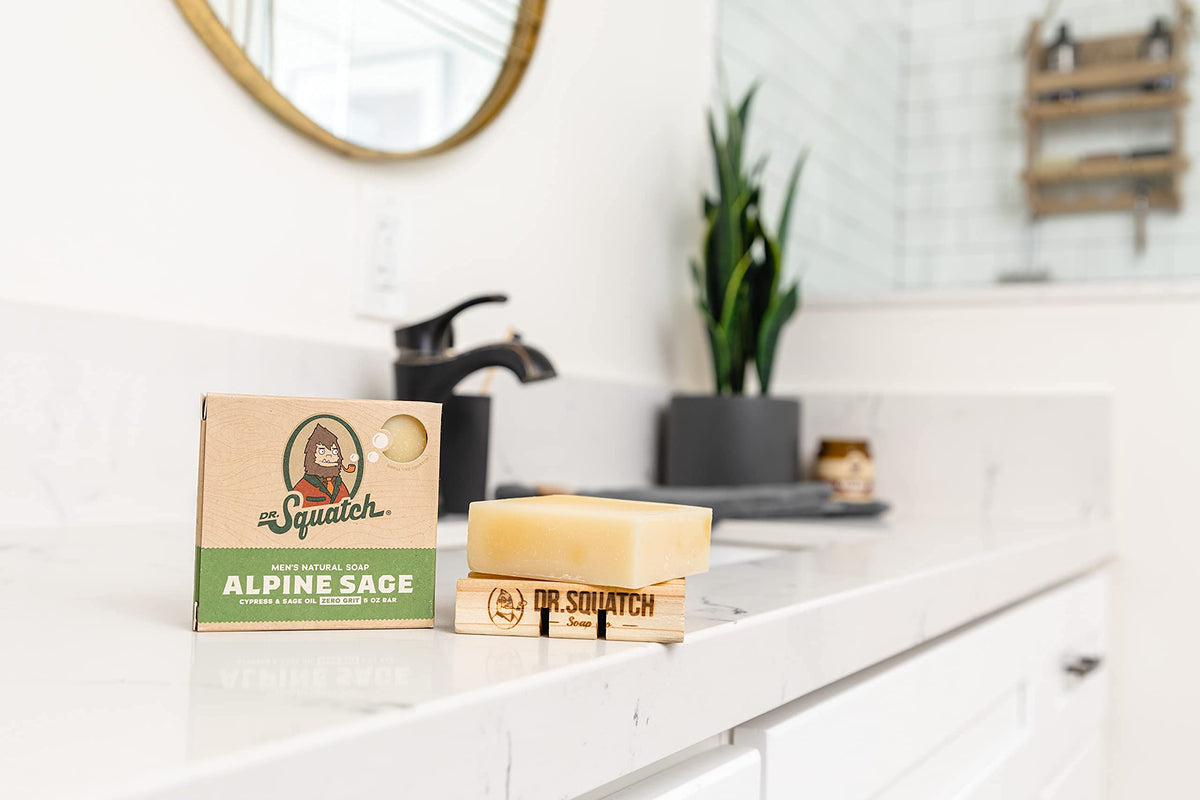 Dr. Squatch Alpine Sage creating creamy lather in hand for easy shaving